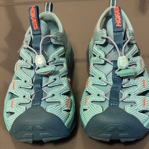 Hoka Aqua and Dark Blue Running Shoes